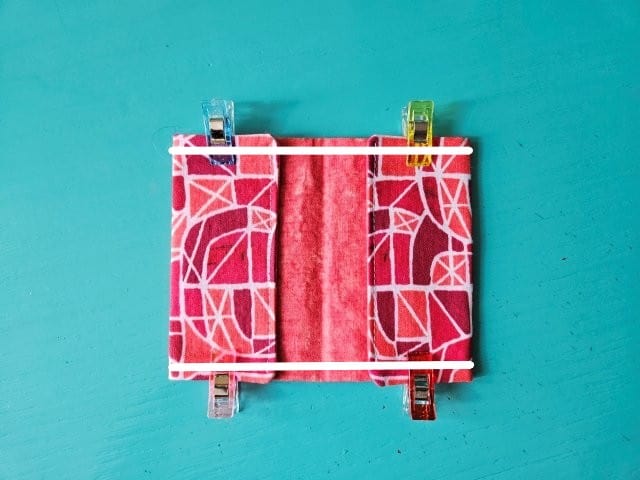 Sew along the sides of the card wallet
