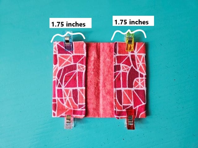 Fold in the short sides of business card holder