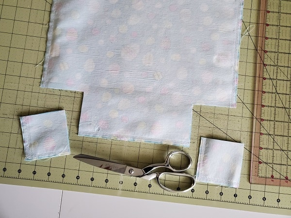 Cut out squares with sewing scissors
