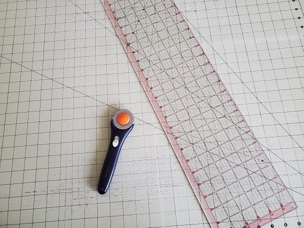 Cutting mat, rotary cutter and clear ruler