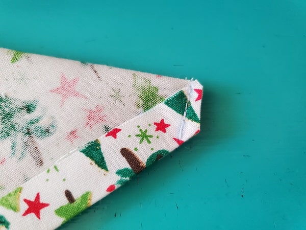 Clip corner of fabric napkin