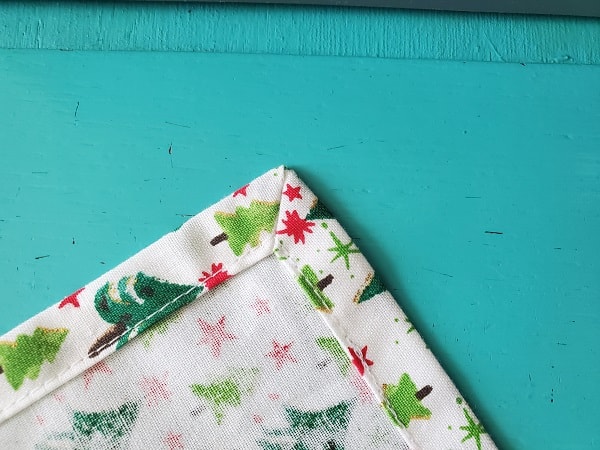 Finished corner of fabric napkin