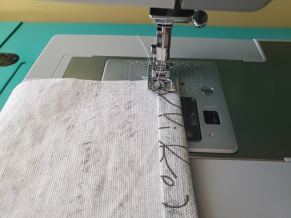 Sewing the hem for the pillow cover