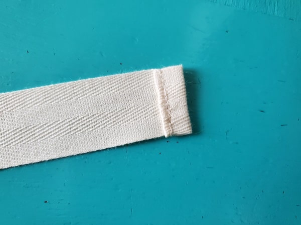 Image of hemmed apron strap