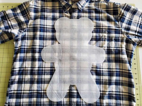 Bear template on shirt before cutting