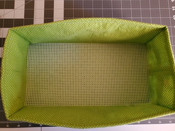 Place mesh in bottom of basket for sizing