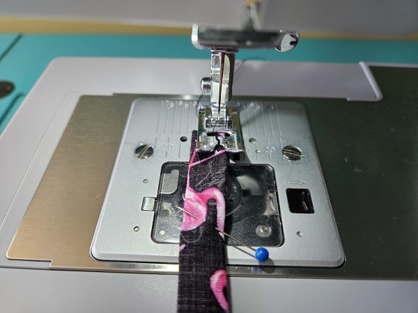 Straight stitch each strap lengthwise