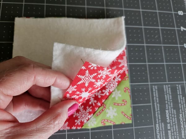 Add the batting on top of fabric back