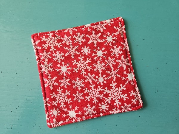 Picture showing the finished back of the quilted square coaster