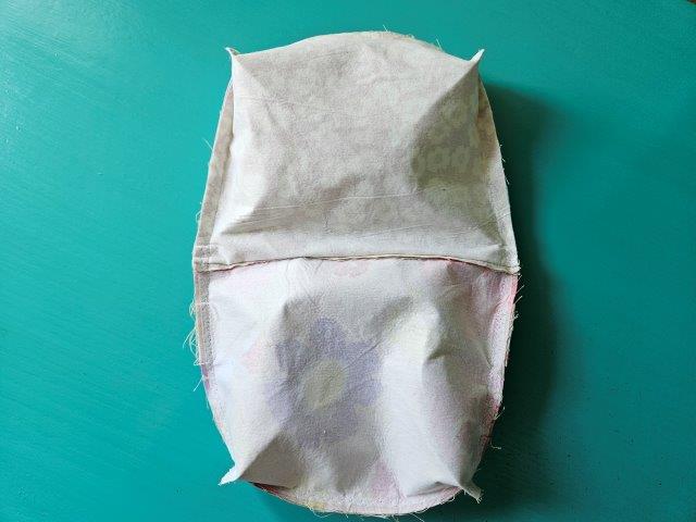 Square bottom of belt bag sewn before turning