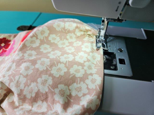 Press the opening and sew closed. Push lining inside the belt bag