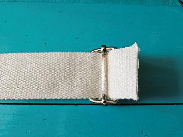Slip cotton webbing through rectangle slide