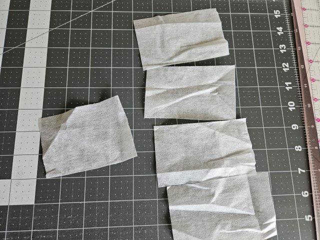 Fusible interfacing cut pieces for mini pouch