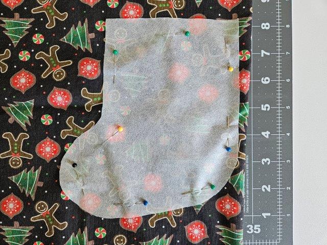 Stocking template pinned to outer fabric