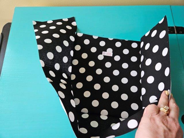 Attach bottom fabric strip to lining fabric