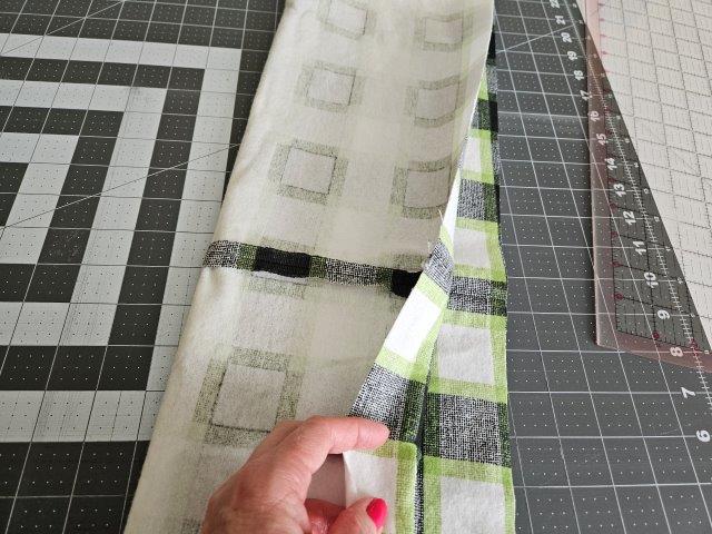 Fold the scarf in half lengthwise, right sides together