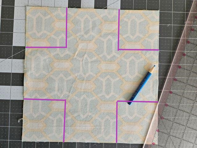 Three inch squares marked on fabric