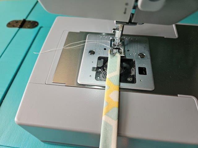 Sew the straps along each long edge