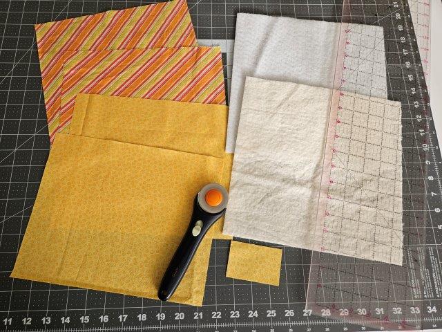 Cut and measure fabric and batting