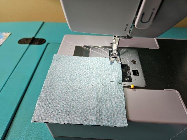 Sew right edge of first and second squares