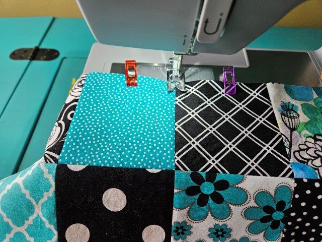 Start in the middle and sew the seams to quilt