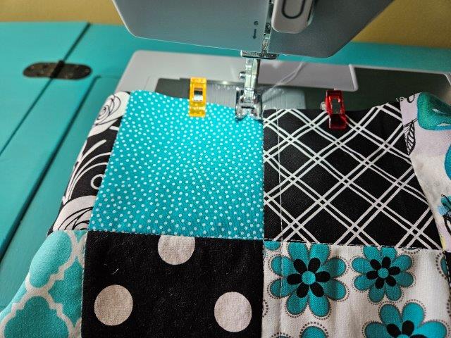 Sew a line to the left of each seam for quilting