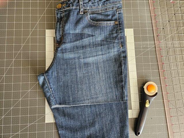 Cut the legs of the jeans