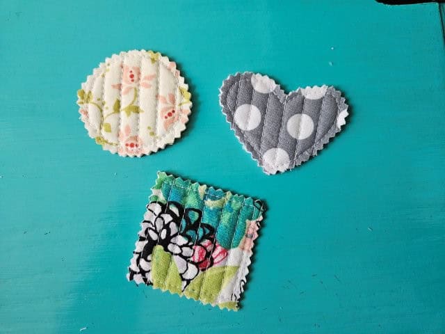 Backs of finished fabric magnets