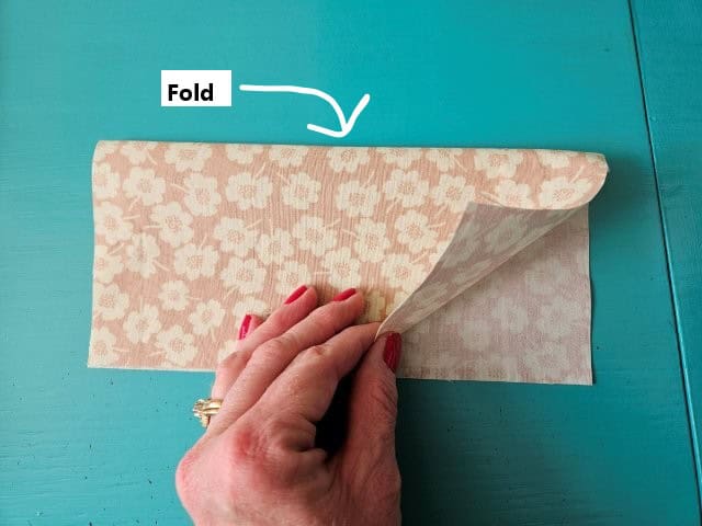 Fold pocket fabric pieces in half