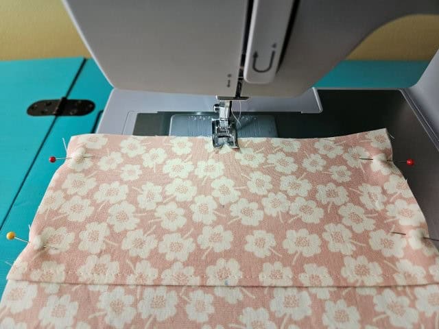 Sew up the middle to create two pockets