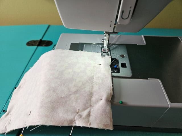 Sewing the lining pieces of the wallet