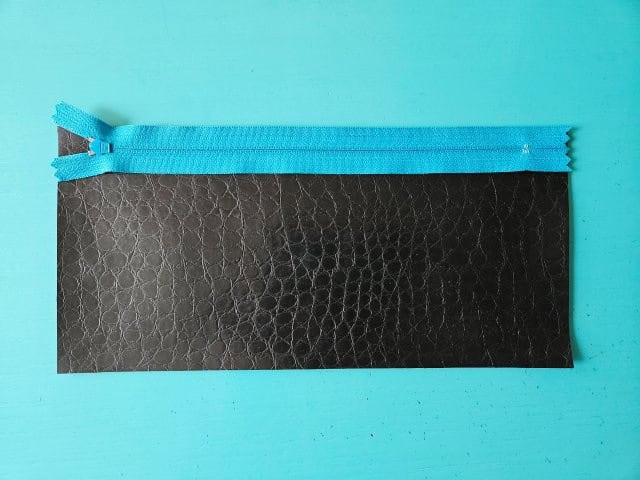 Zipper face down on vinyl piece