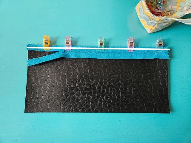 Sew along the zipper