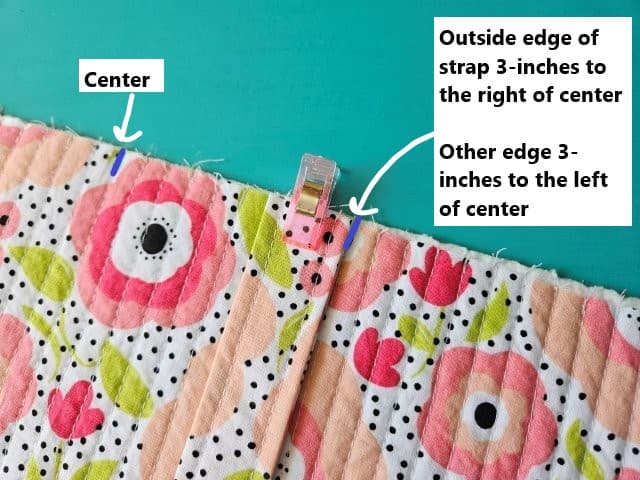 Place the strap edges at the left and right marks