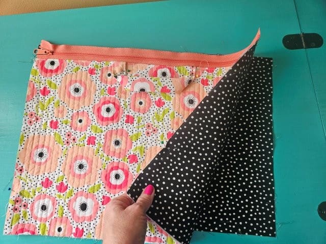 Place zipper on top of lining fabric right sides together