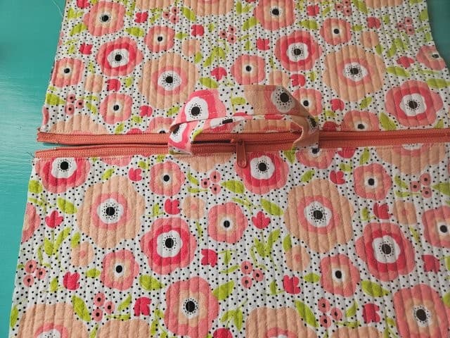 Open laptop sleeve zipper halfway