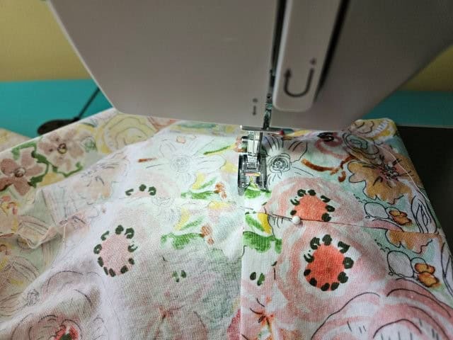 Sew around the bottom of the hem of the pillowcase