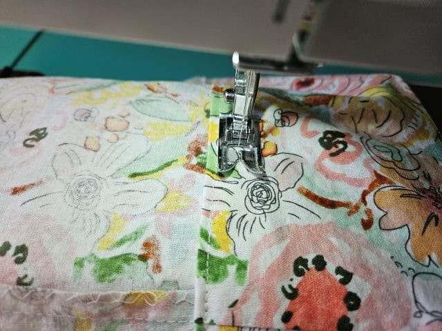 Sew around the hem again 1/2 inch from previous stitches