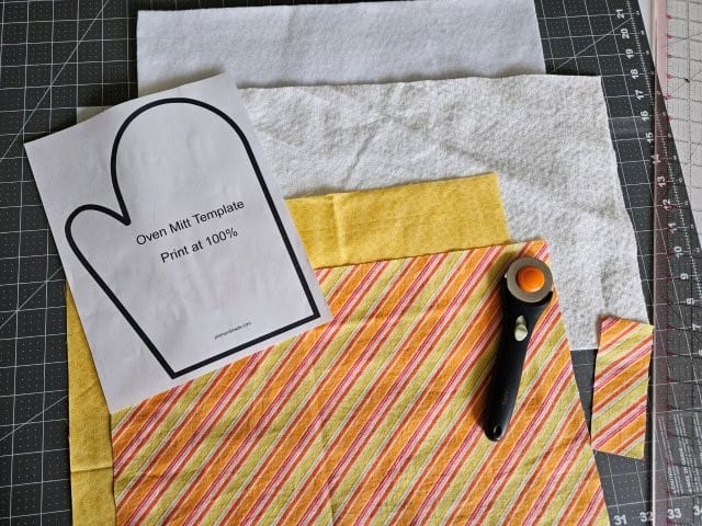 Cut fabric, batting, and Insul-Bright for oven mitt