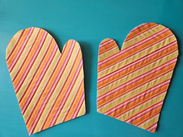 Two mitts mirror image of each other