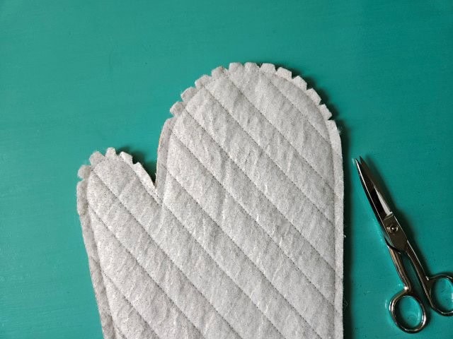 Make little triangle cuts around the curves