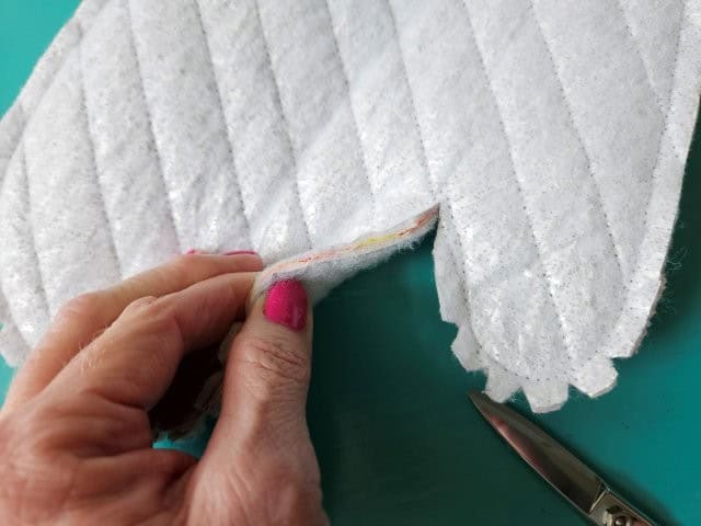 Cut a slit in the sharp corner