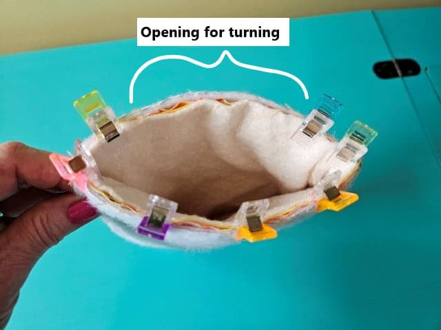 Sew bottom of oven mitt leaving opening for turning