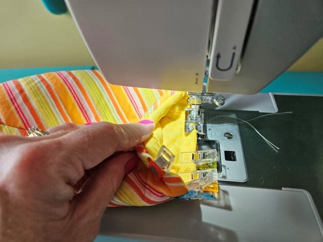 Top stitch around the bottom of the oven mitt