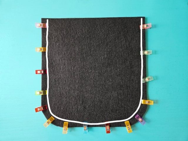 Sew the sides and bottom of the faux leather sling bag