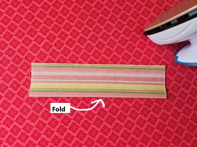 Fold the basket handle in half lengthwise