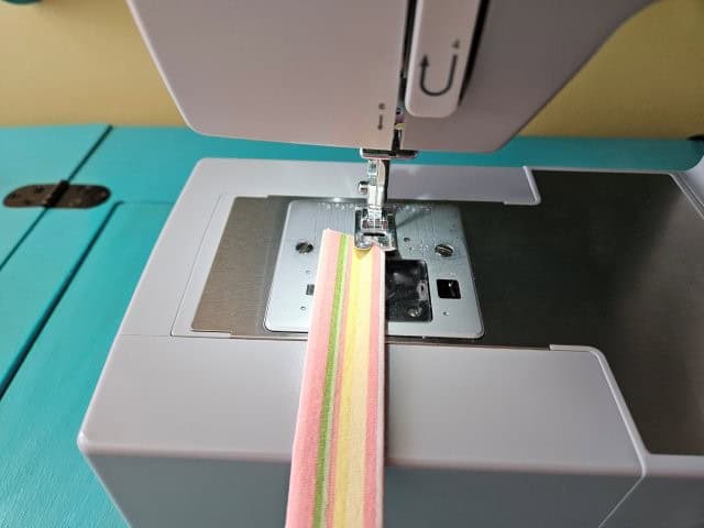 Sew both sides of strap lengthwise