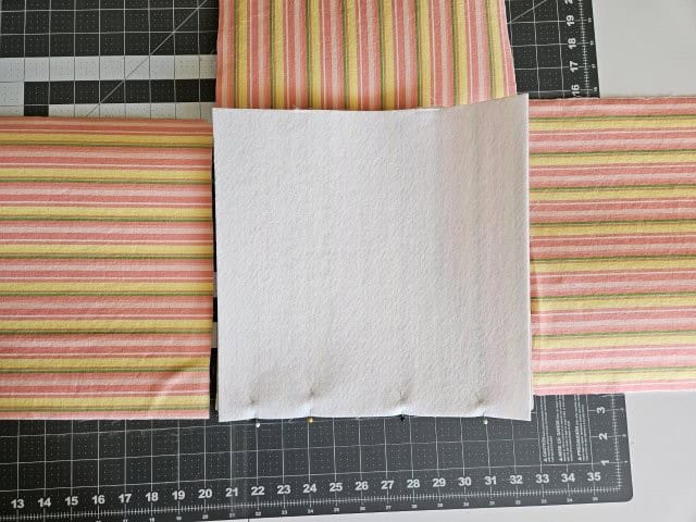 Sew the opposite square to the base of the basket