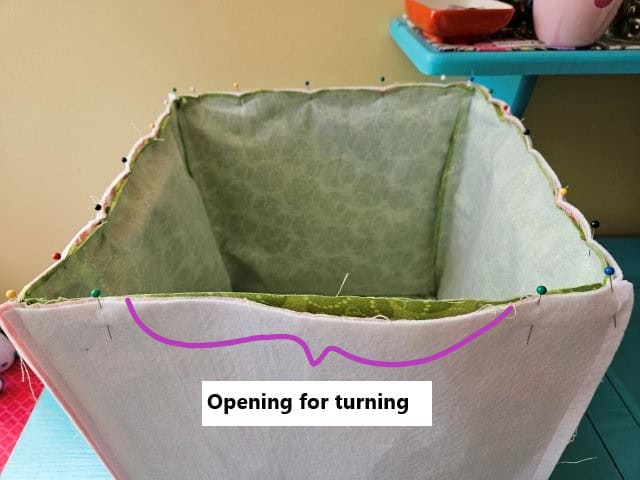 Pin around the top of the basket, leaving an opening for turning