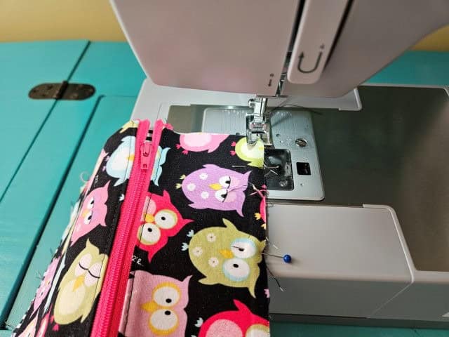 Baste the front pocket lining to hold in place.